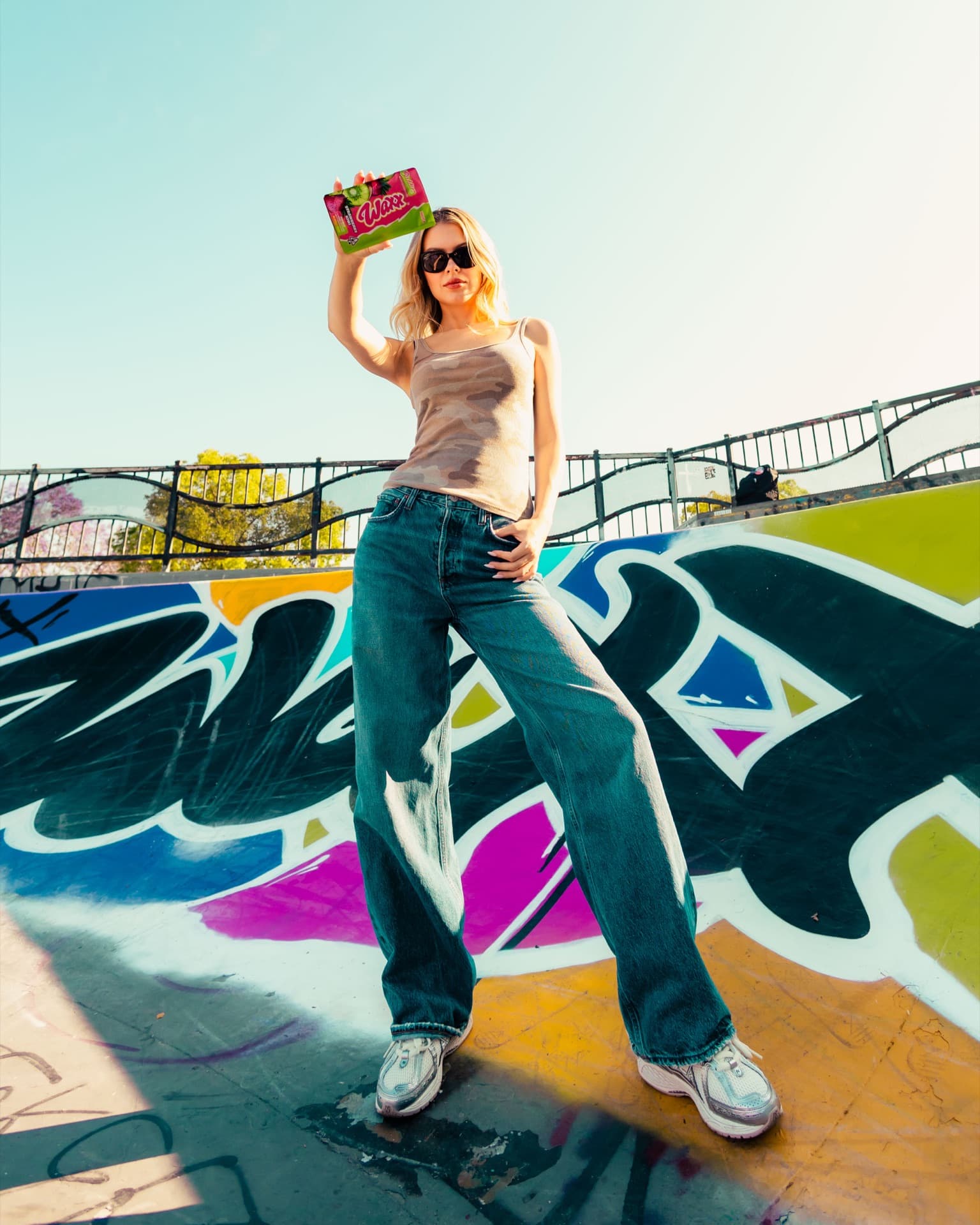 Waxx skatepark, palm trees + ramp graffiti